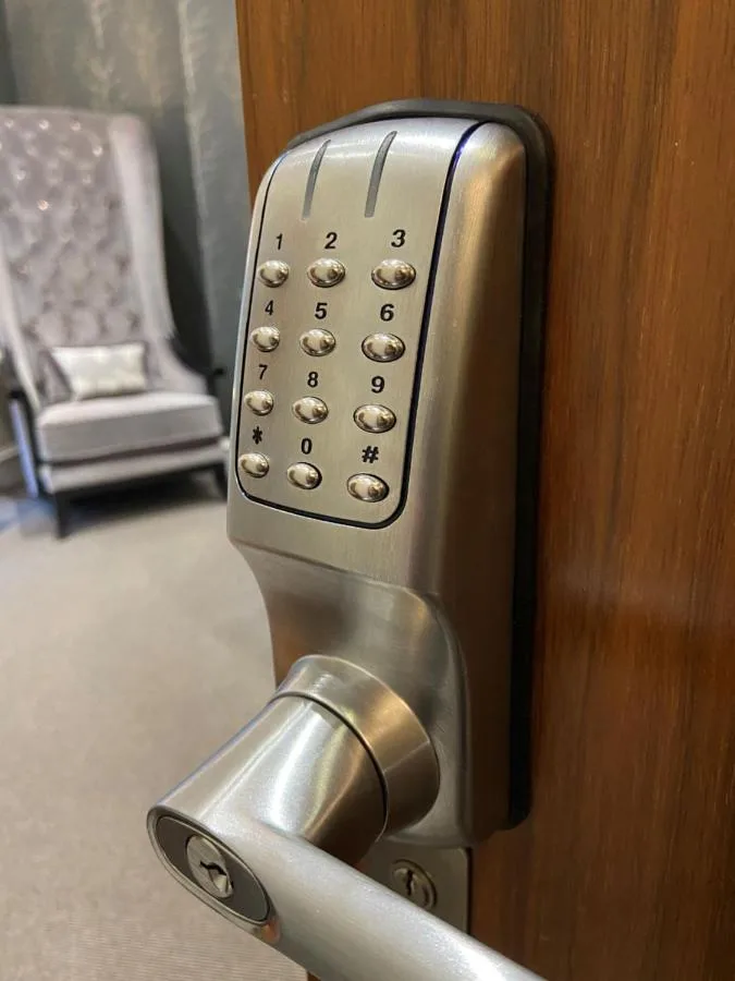 a close up of a door with a remote control at The Craibstone Suites in Aberdeen
